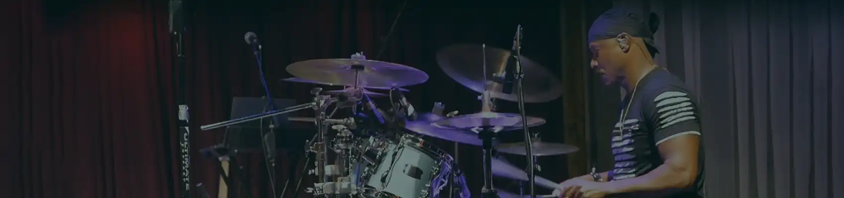 Sonny Emory playing the drums onstage One of many performances discussed in this Reunion Recording Session